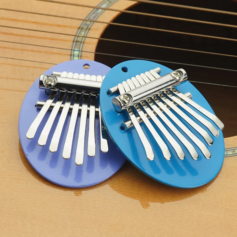 8 Keys Mini Kalimba Thumb Piano Portable Finger Piano Cute Pendant Toy for Kids Beginners with Metal Base view 4