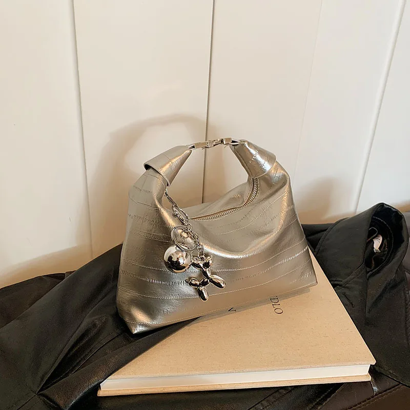 

​​2025 Viral Designer Crossbody Bag for Women Unique Dumpling Purse Trendy Versatile Shoulder Bag Chic Outing Handbag​
