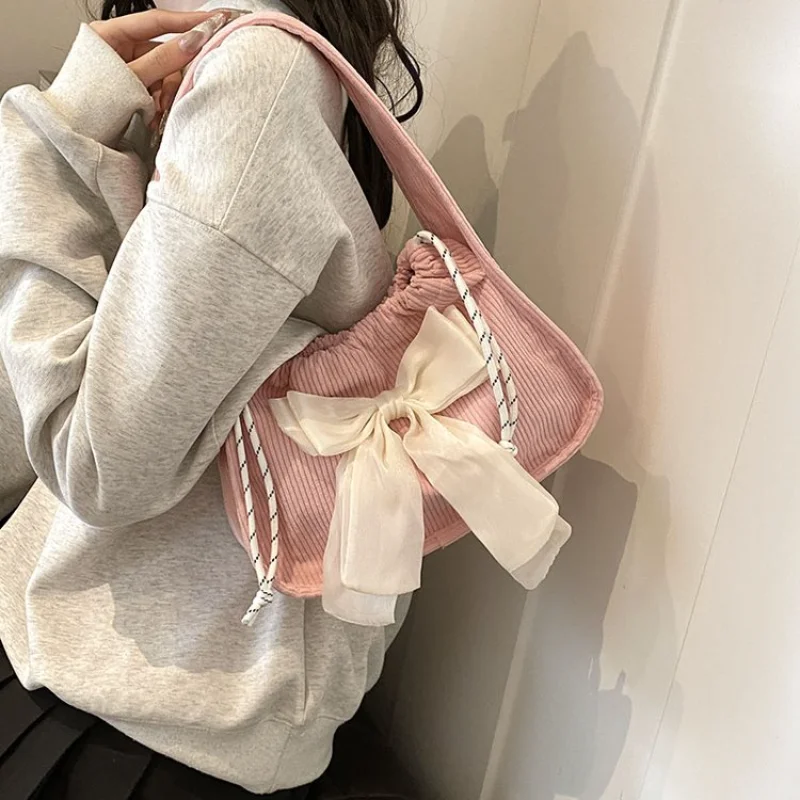 

Women's Versatile Pink Corduroy Mini Shoulder Bag with Bow Accent for Work, Errands, Travel and Everyday Wear Women Handbags