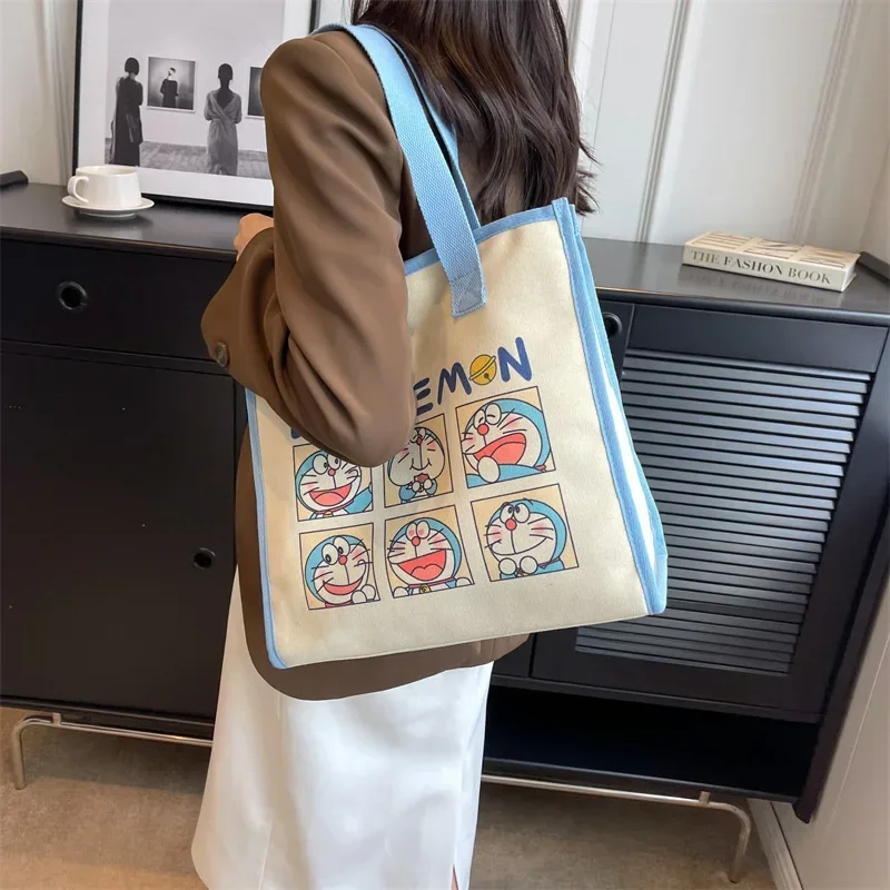 Sac fourre-tout en toile Doraemon pour femmes, sac de rangement de grande capacité, sac à main de classe étudiant, nouvelle mode, dessin animé