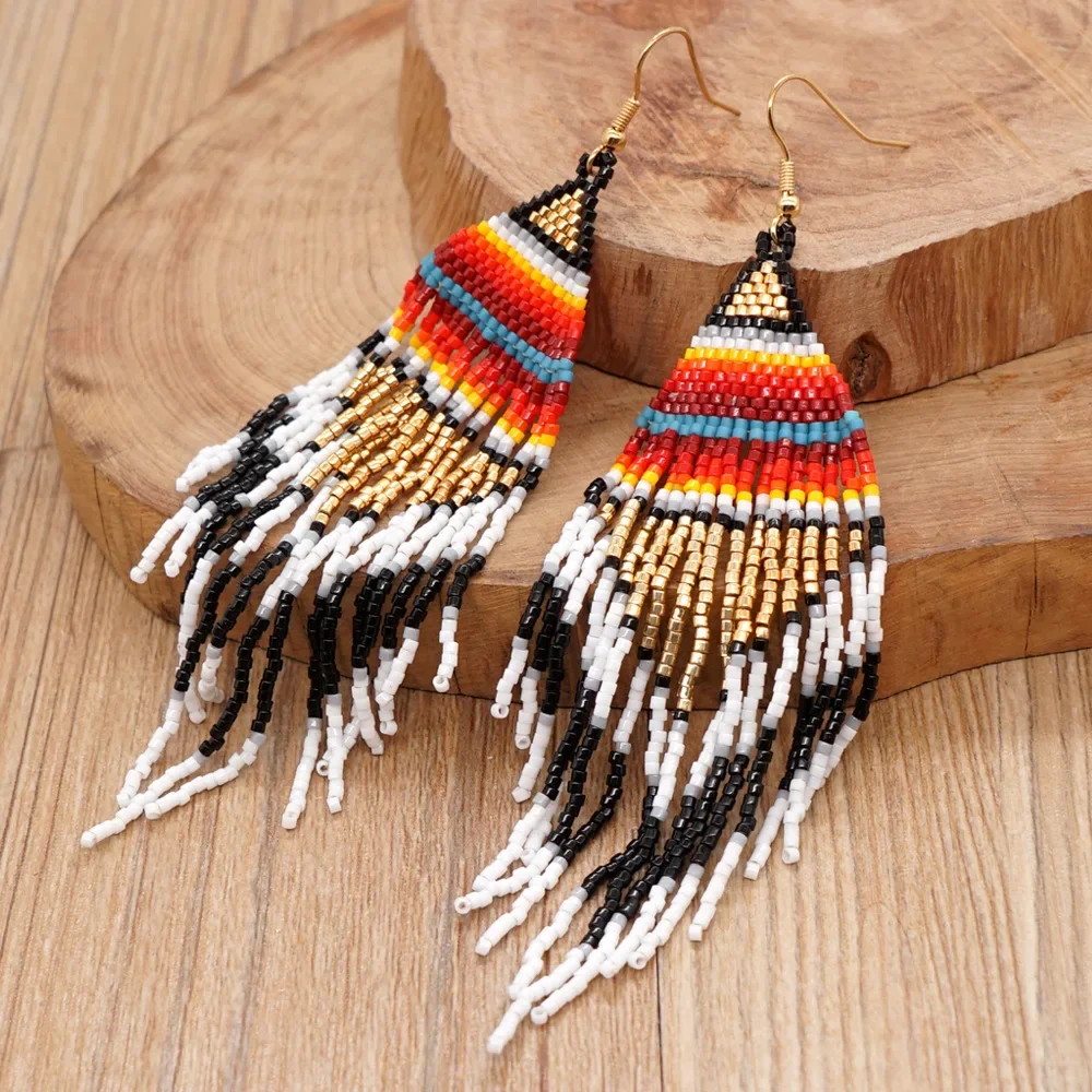 

Fringe Earrings Hand knitting Retro nation Beading personality Simple Bohemia geometry alloy ma'am Rice Bead Earrings