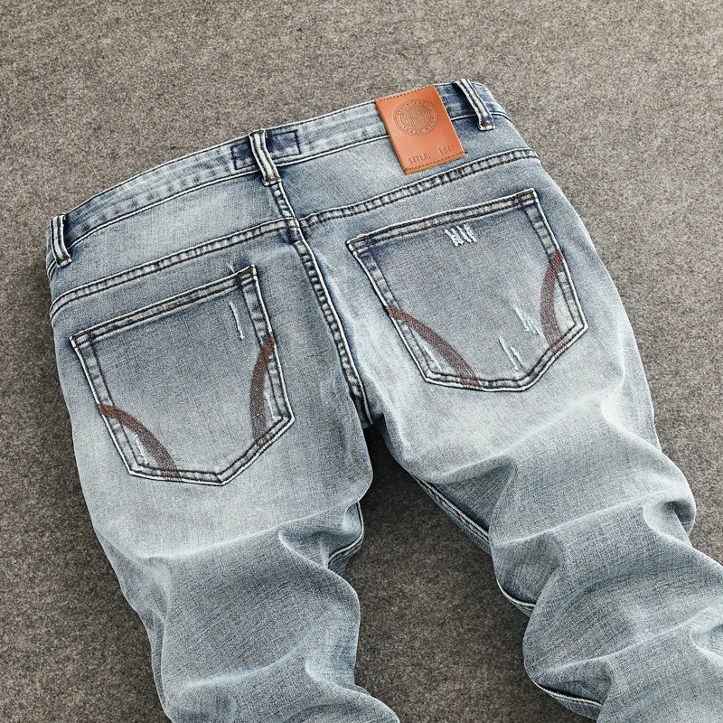 Designer Fashion Men Jeans High Quality Retro Light Blue Stretch Slim Fit Painted Ripped Jeans Men Vintage Denim Pants Hombre