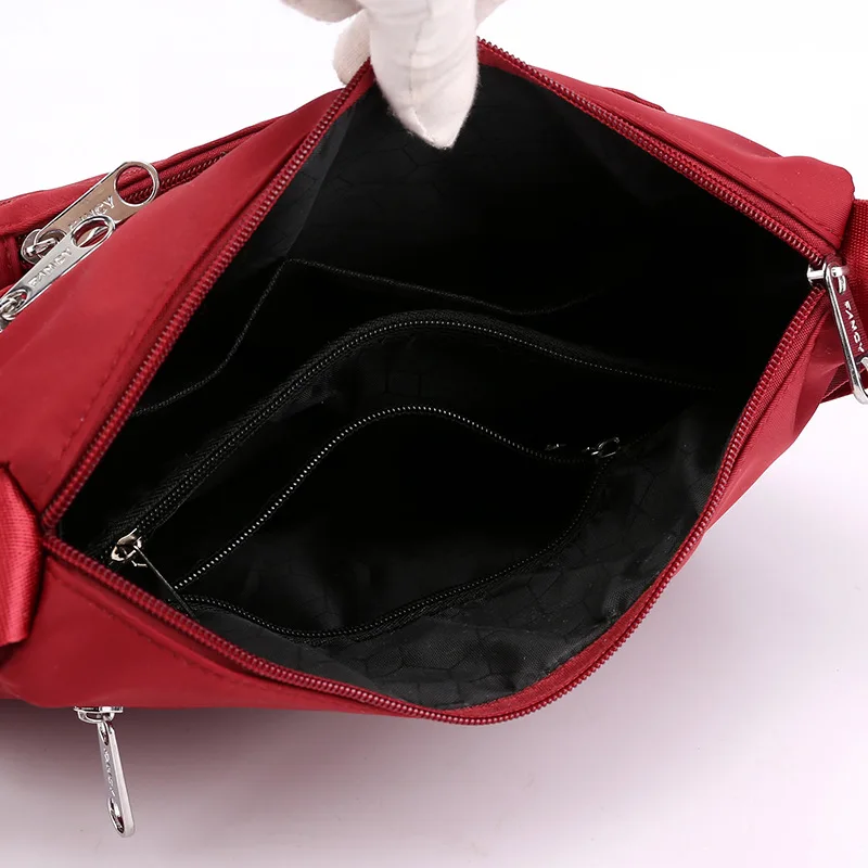 Borsa a tracolla da donna di grande capacità per il tempo libero in Nylon leggero nuova borsa a tracolla da viaggio multistrato da donna semplice e Versatile