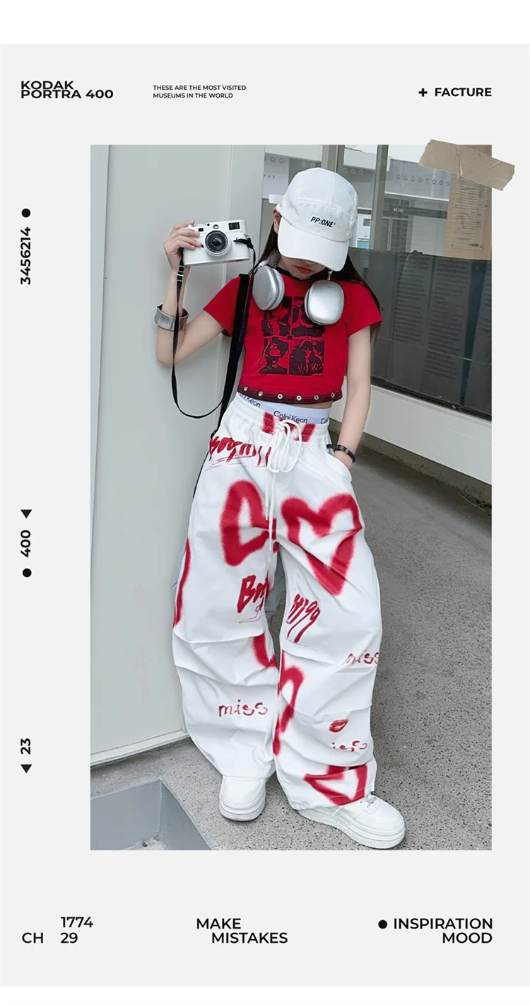 Kinder Hip-Hop Modehose mit Kordelzug und Zeichnungen für Teenager-Mädchen Coole Y2K Streetwear-Hose mit Herz-Graffiti 5-14 Jahre – Detail 7
