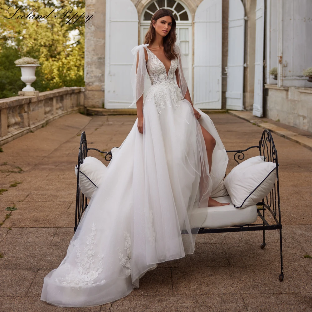 Lceland Poppy Customized A Line Deep V Neck Beaded Lace Wedding Dresses Sleeveless Glitter Tulle Illusion Bridal Gowns