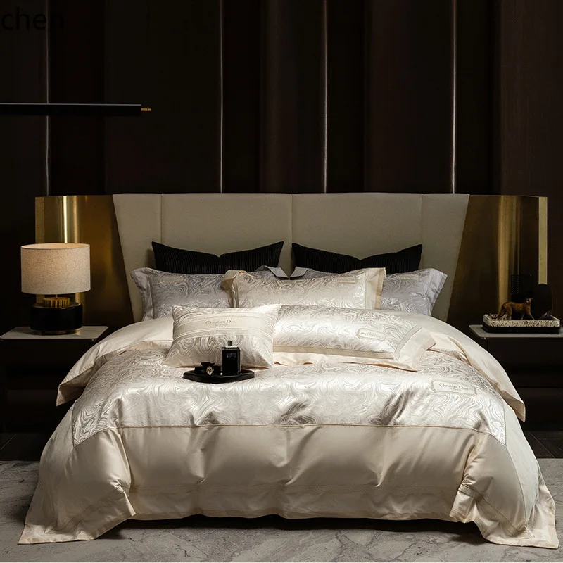 HXL  four-piece embroidered soft and skin-friendly bedding set with rounded corners, includes flat sheet and fitted sheet