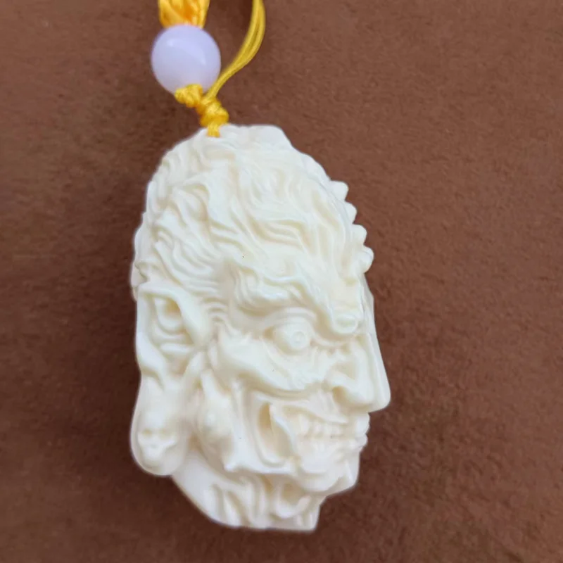 Factory Direct Supply New Product Ivory Nut Carved a Flash of Thought Pendant Double-Sided Buddha Devil Pendant Car Hanging Hand