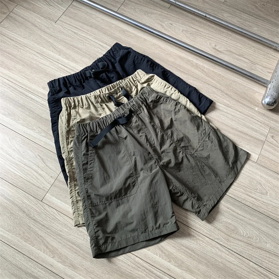 

Японские функциональные шорты Nanga из ветрозащитного, водонепроницаемого и износостойкого нейлона для мужчин и женщин, высококачественные повседневные свободные шорты