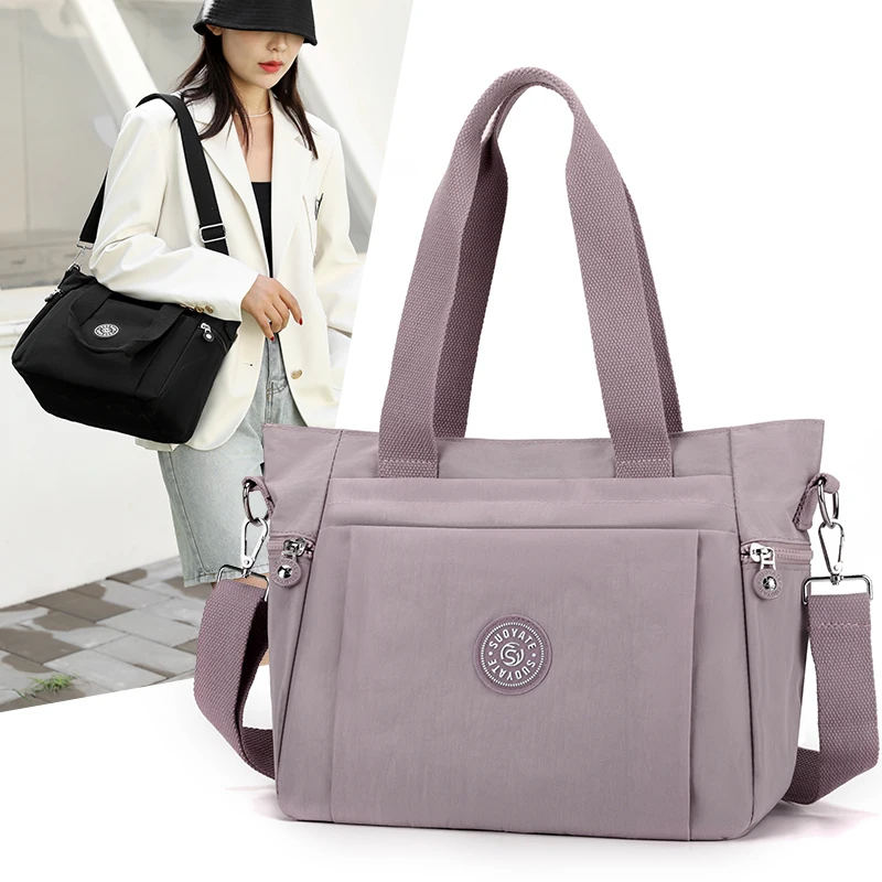 

Large Capacity Female Travel Handbag High Quality Fabric Women Shoulder Bag Fashion Multi pocket Design Female Casual Tote