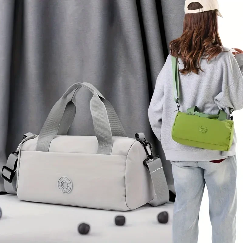 

Lightweight Stylish Women Messenger Bag Nylon with Polyester Lining Compact Round Barrel Design Removable Straps Zipper Closure
