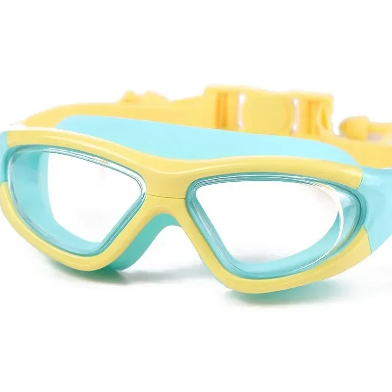 Wasserdichte und beschlagfreie Schwimmbrille für Kinder mit großem Rahmen, praktische Schwimmbrille mit Silikon-ohrstöpseln. – Detail 7