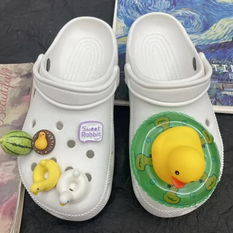 

Cartoon Cute DIY Charms for Clogs Lovely Duck Swimming Circle Sandals Decoration Whole Set Shoe Charms Designer Trend All-match