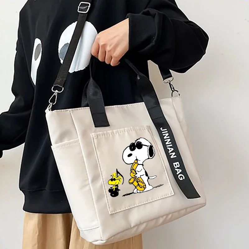 Bolso de hombro Snoopy, bolsos impermeables a la moda, correas ajustables, bolso de mano con estampado de Anime bonito de alta capacidad para mujer, bolso de dibujos animados de alta calidad