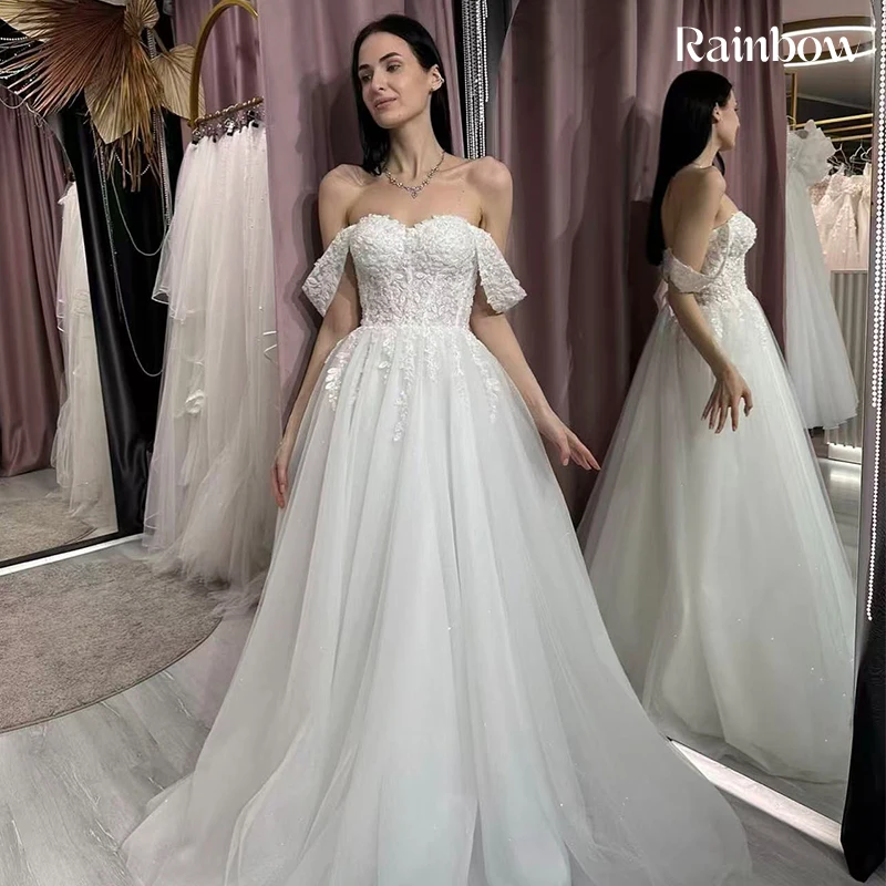 فستان زفاف مكشوف الكتفين من الأورجانزا مع تطريز على شكل حرف a بطول الأرض فستان زفاف مخصص برباط فيستدو دي نوفيا ترتر