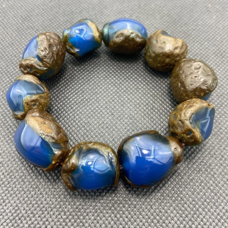

Genuine blue rainbow high-end new model bracelet with natural , selected honey amber, unisex, size approximatel