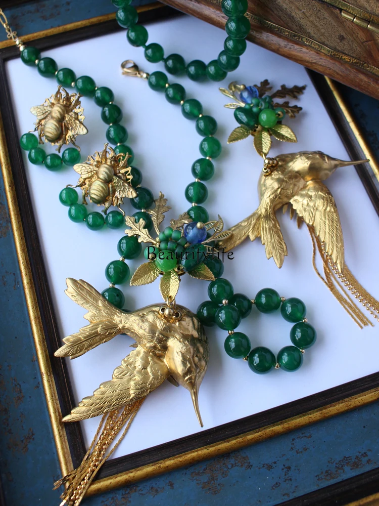 Green glazed beaded natural stone three-dimensional hummingbird metal fringed handmade ear clips