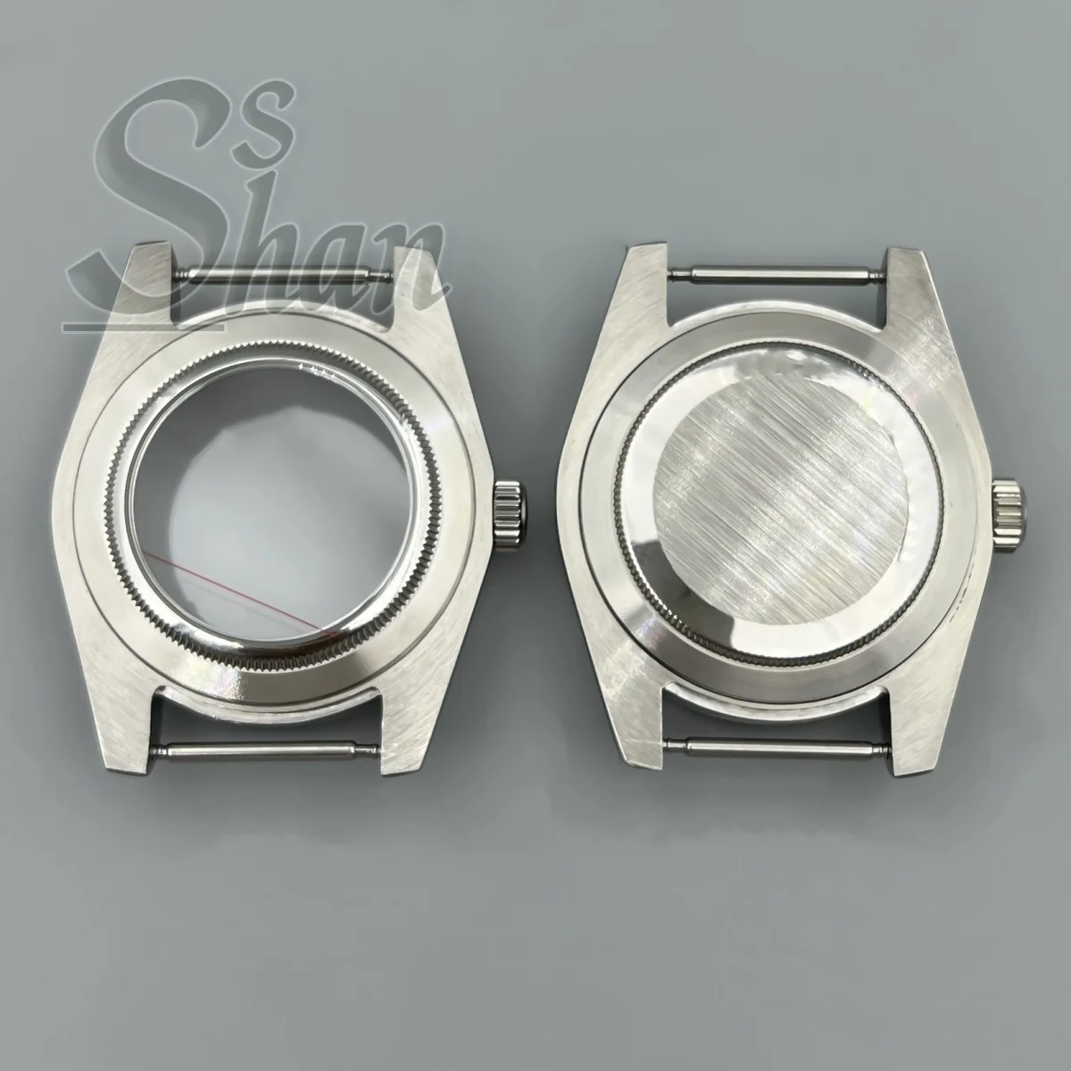 La caja pulida de 36 mm/39 mm con cristal de zafiro y borde verde es adecuada para el movimiento NH35 NH36 Miyota DG ETA2824 PT5000