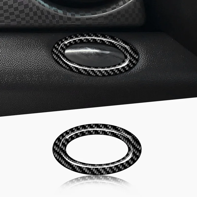 

A genuine carbon fiber decorative ring for the lock frame of the front passenger panel box of the MINI-R56-59 2015 car