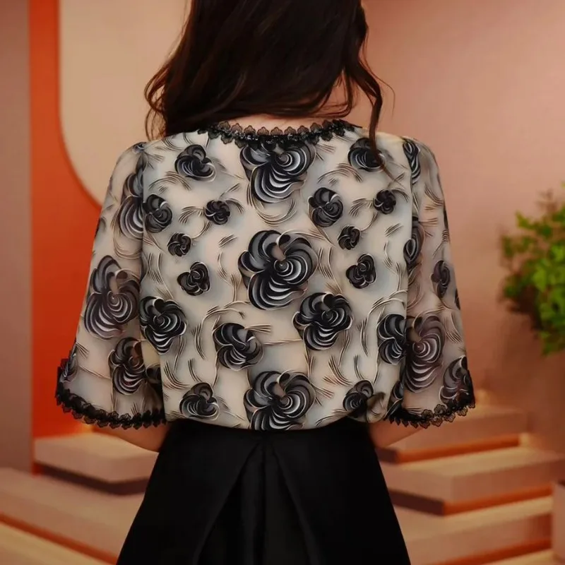 High-end estilo estrangeiro moda temperamento redução de idade impressão design camisa 2025 verão nova blusa feminina fina solta