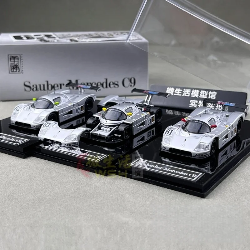 

YS 1:64 Sauber C9 Le Mans die-casting simulation static open cover alloy car model, boys' festival gift toy collection ornament.