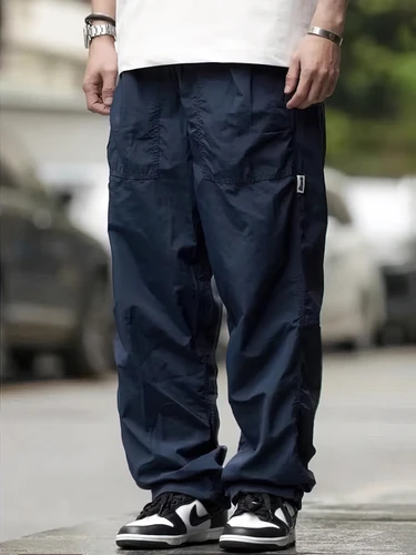 Imagen 2 del producto Pantalones de paracaídas impermeables para exteriores, pantalones informales holgados de pierna ancha para motocicleta, ropa de calle, pantalones de chándal deportivos para correr