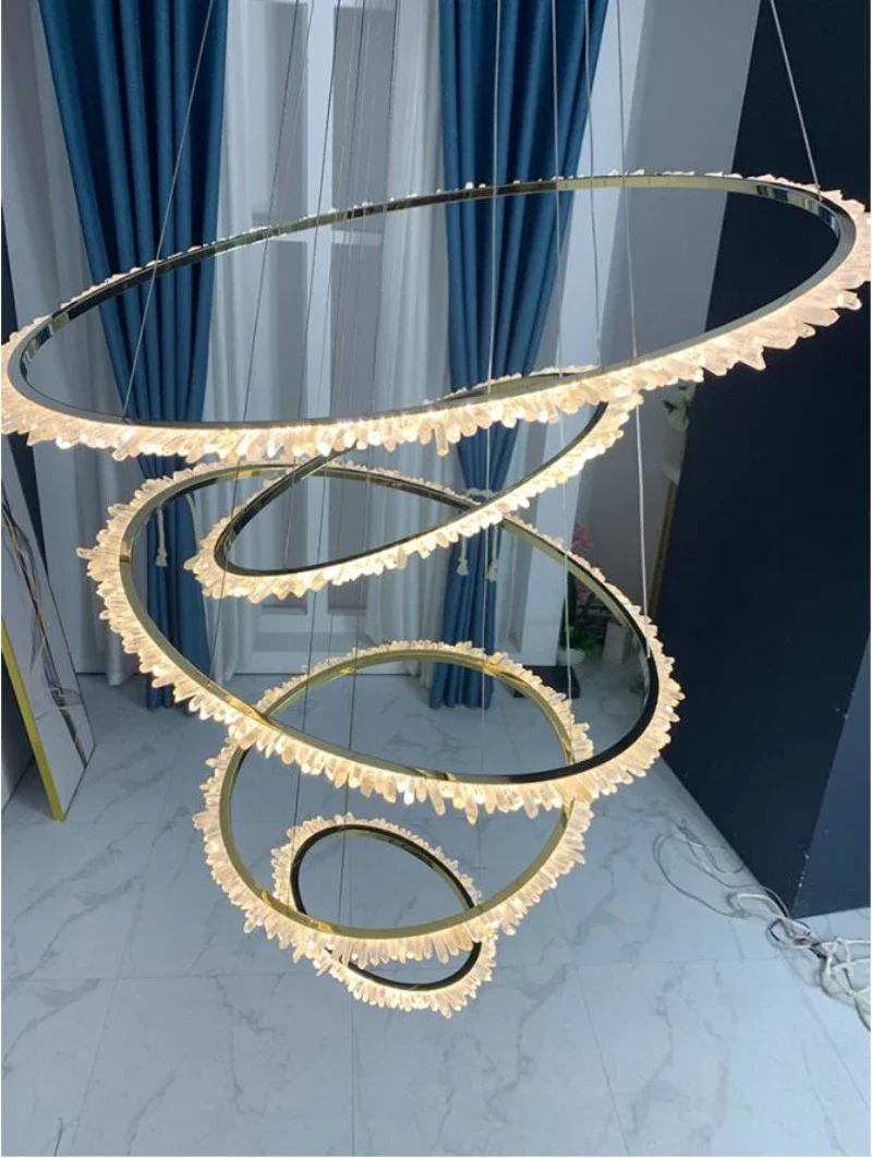 Luxury duplex building crystal chandelier living room staircase golden modern simple shape circle circular lamps LED lighting