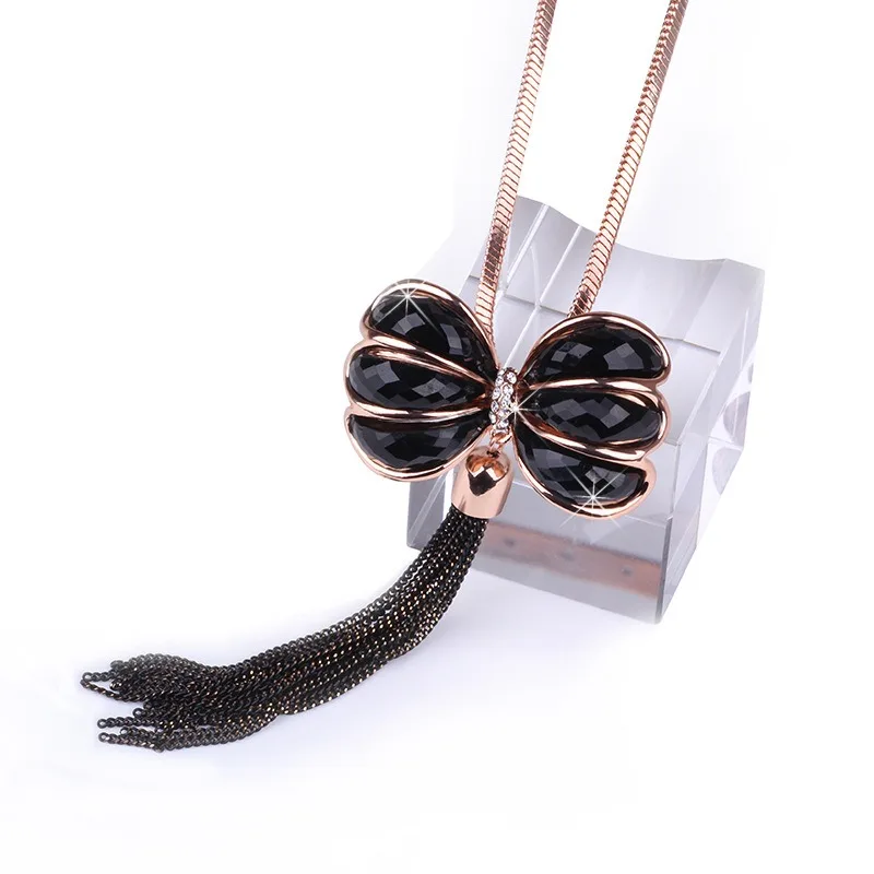 Nuova collana da donna lavorata a maglia di fascia alta con nappa a fiocco, lunga collana lavorata a maglia con catena in osso di serpente