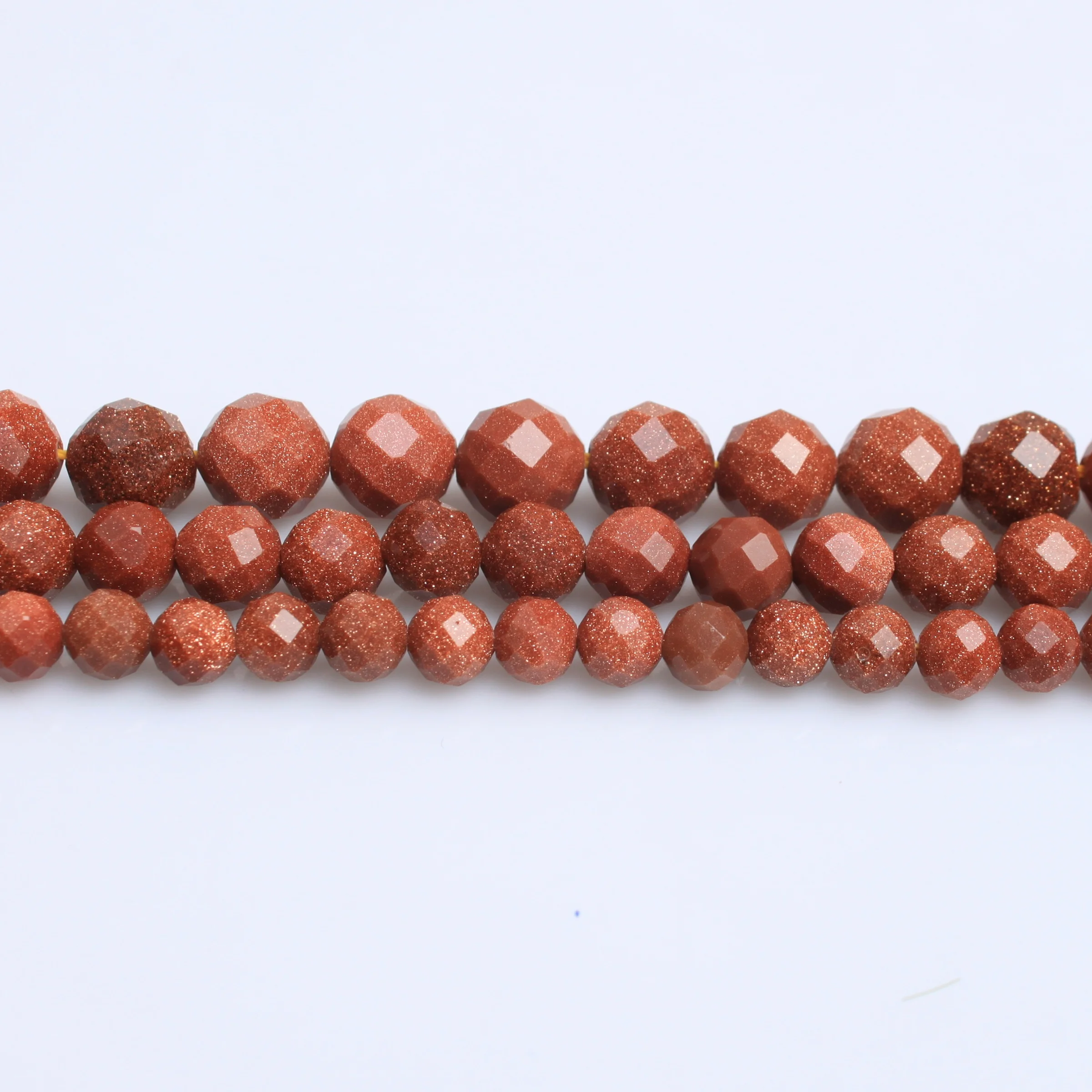 

Factory direct sales of natural stone AAAA gold sand stone engraved round beads 6-10mm DIY bracelets, jewelry accessories