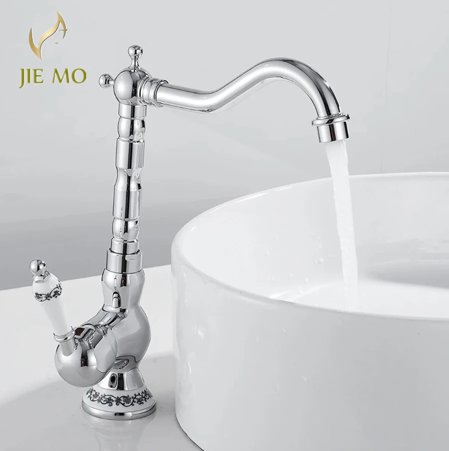 Genuine antique kitchen: Rotating cold and hot water faucets, golden and silver chrome faced basin faucets, black bathroom tap