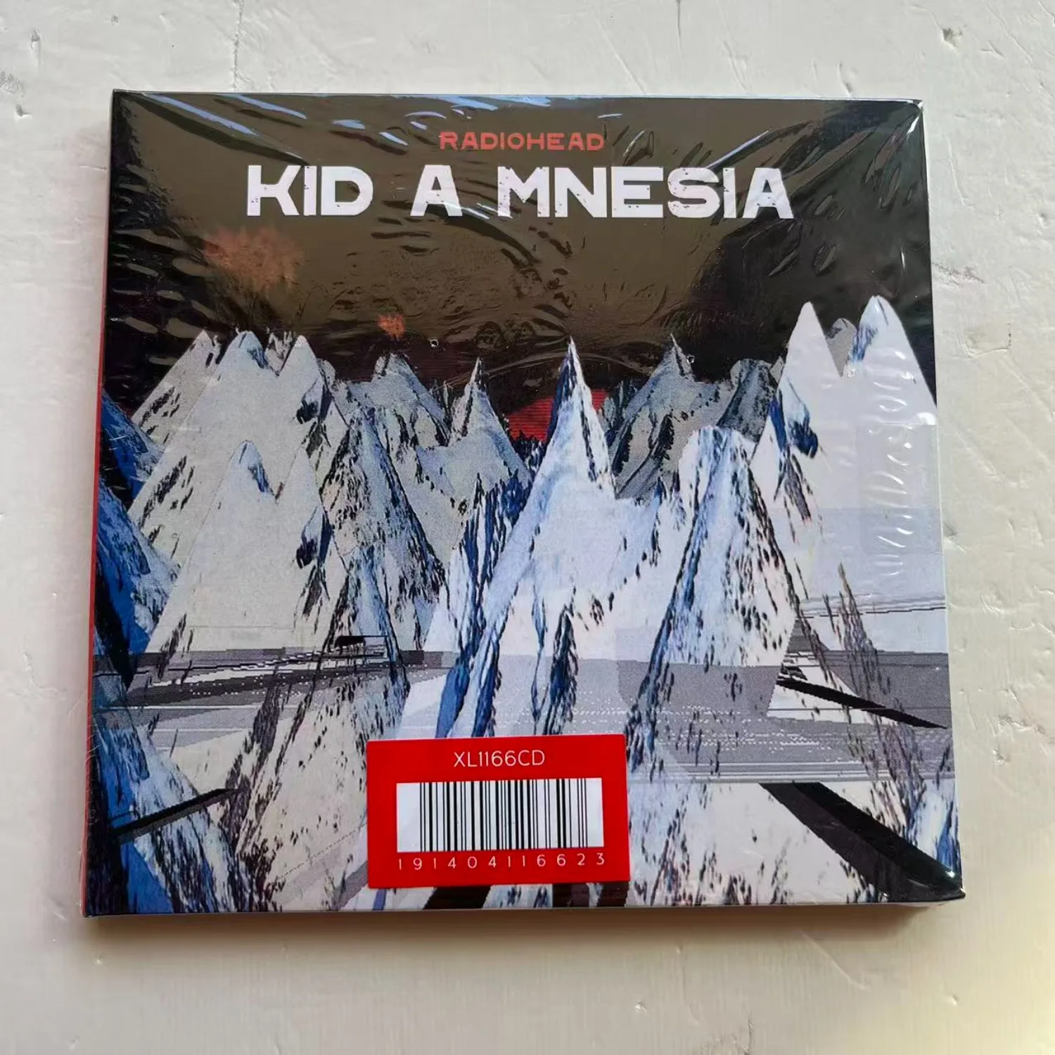 

Kid A Mnesia CD Compilation, Alternative & Experimental Rock with Avant-Garde Arrangements & Atmospheric Electronic Vibes