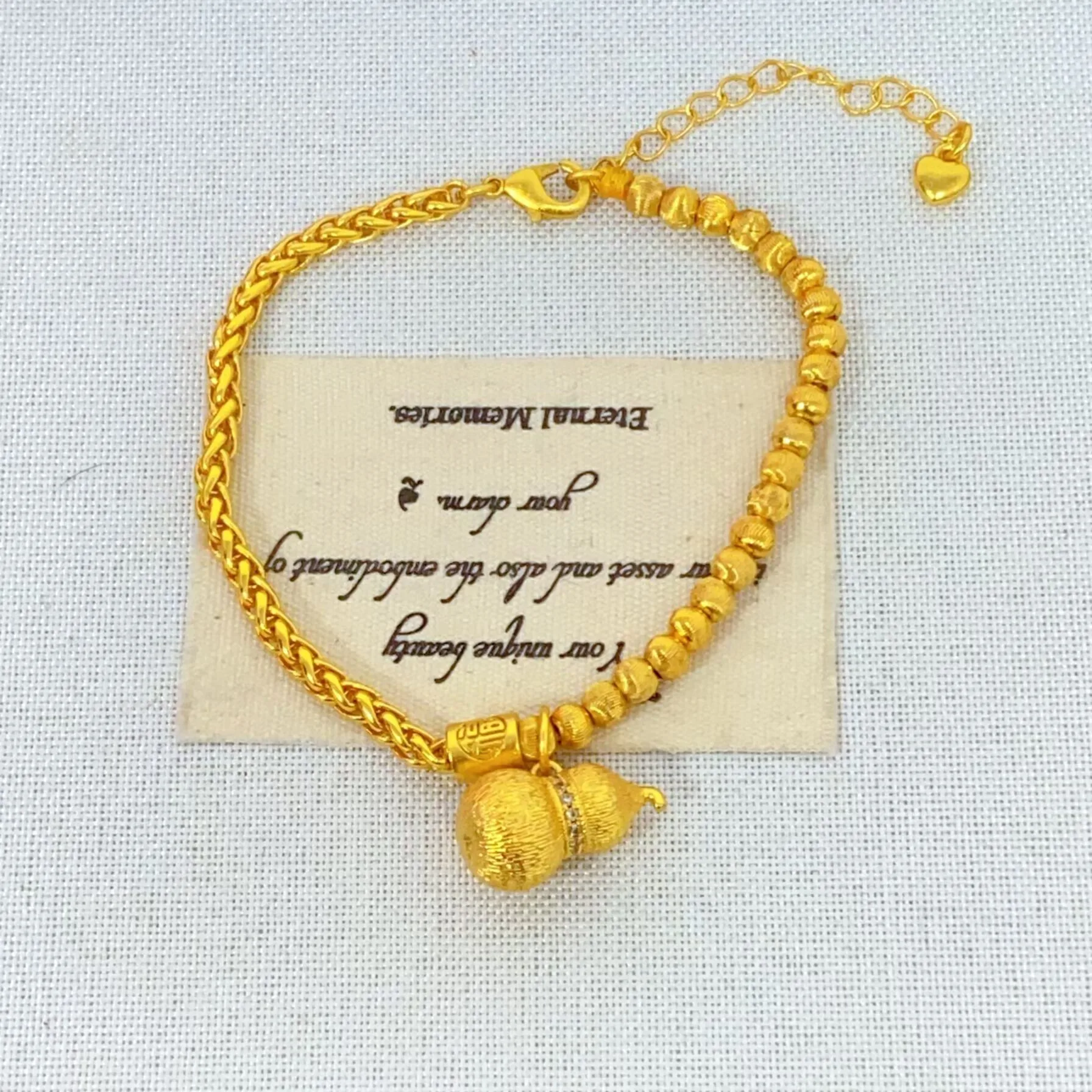 

Gold Plated Strong Preservation Ancient Sand Cat Eye Lucky Character Gourd Chain Design High End Light Luxury Bracelet Girls Gi