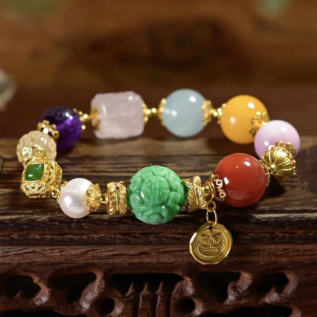 

Браслет из натуральных разноцветных камней: аквамарин, янтарь, красный агат, жадеит, яшма, розовый кварц, жемчуг, серебро 925 пробы, китайские украшения.