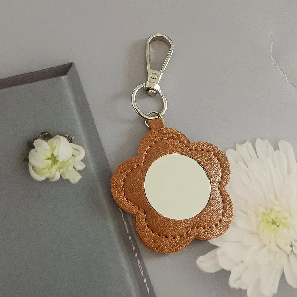 Nueva Mini mochila de cuero portátil, colgante, llavero, paquete de anillo, llavero con espejo de maquillaje, accesorio pequeño, llavero de regalo