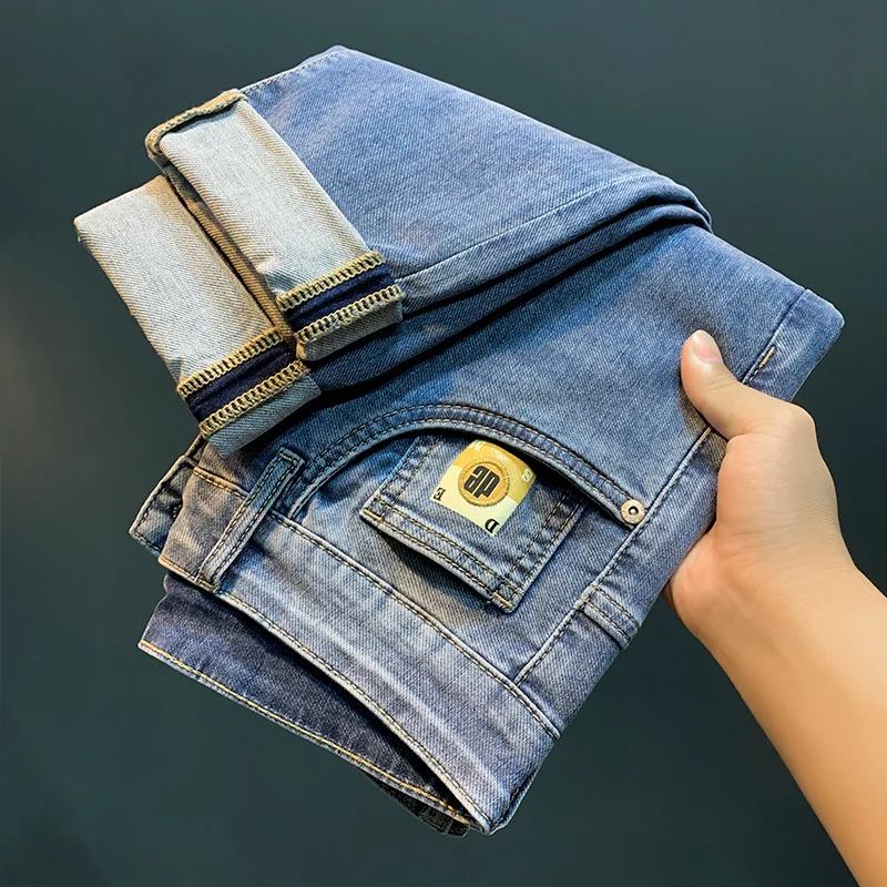 Celana jeans tipis pria, celana panjang pergelangan kaki biru muda Korea jalanan modis slim fit, celana kasual kelas atas