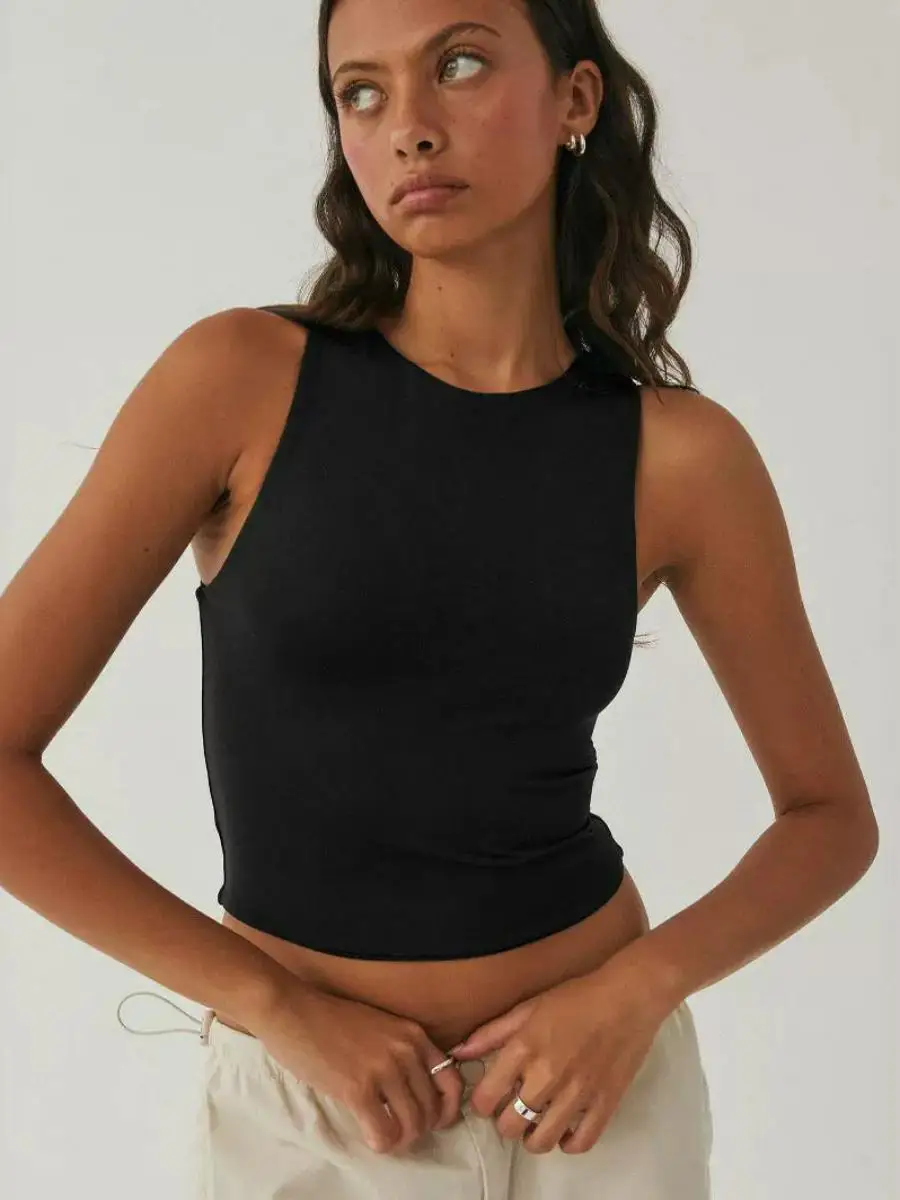 توب نسائي مثير بتصميم Y2K، قصير وضيق بدون أكمام، برقبة مستديرة، ملابس خارجية قصيرة بلون موحد مصنوعة من ألياف ثلاثية الأسيتات