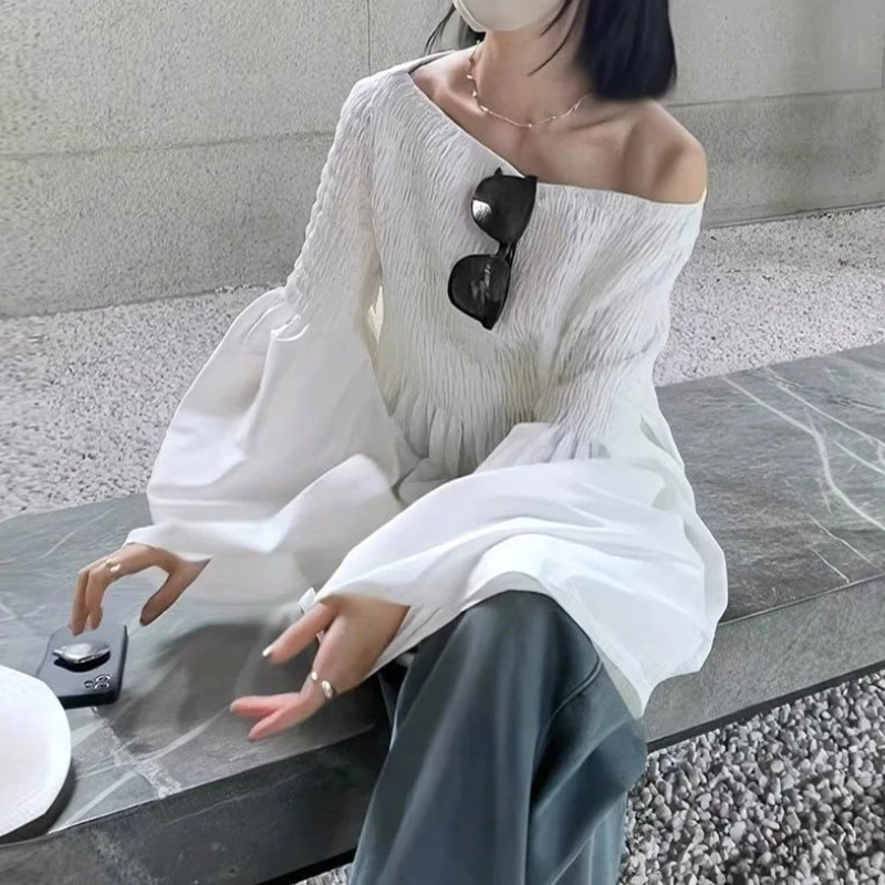 

Beautiful white shirt women's 2026 new one-word shoulder pullover horn sleeve doll shirt