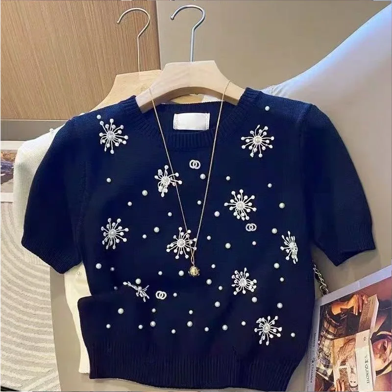 

Женская одежда, футболка с коротким рукавом, летние французские модные винтажные шикарные вязаные топы с жемчужным цветком и круглым вырезом, повседневные однотонные тонкие пуловеры
