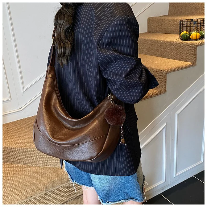 

Women's Versatile Soft Leather Crescent Shoulder Bag with Pom Pom Accent for Work, Errands, Travel and Everyday Wear Women Bag