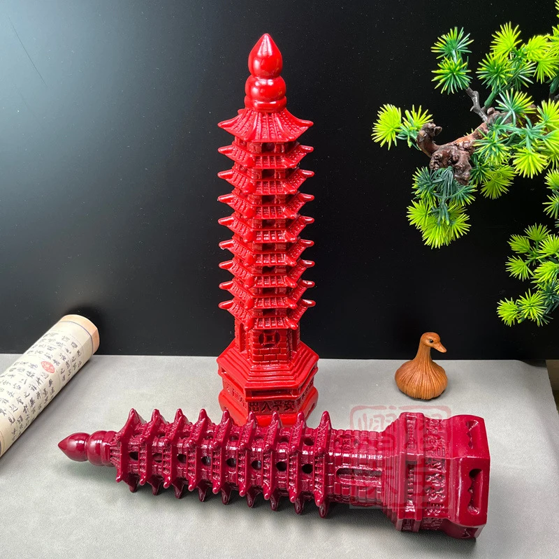 Resin cinnabar nine-story extended Wenchang Pagoda Feng Shui ornament with a green dragon in the top left corner of the desk