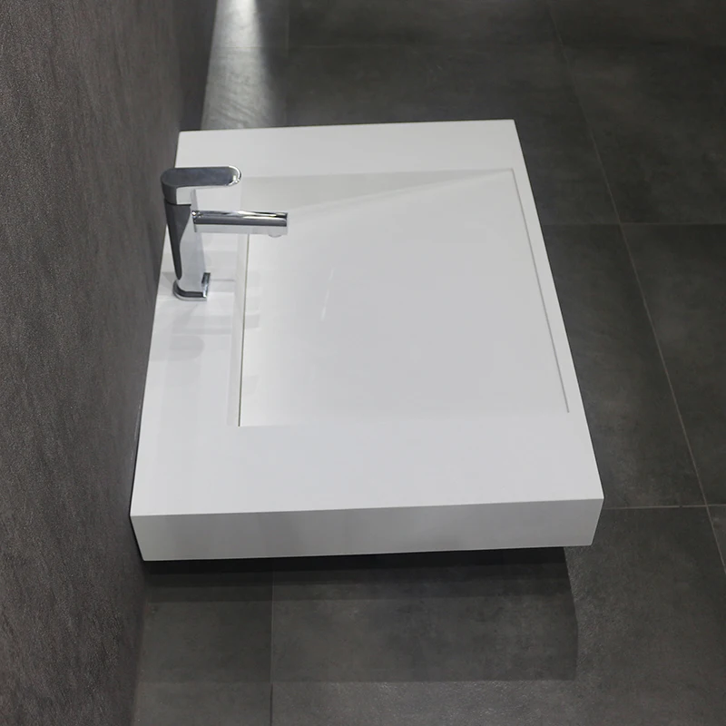 Man Made Stone Solid Surface Seamless Joint Wall Hung Wash Basin in White Color