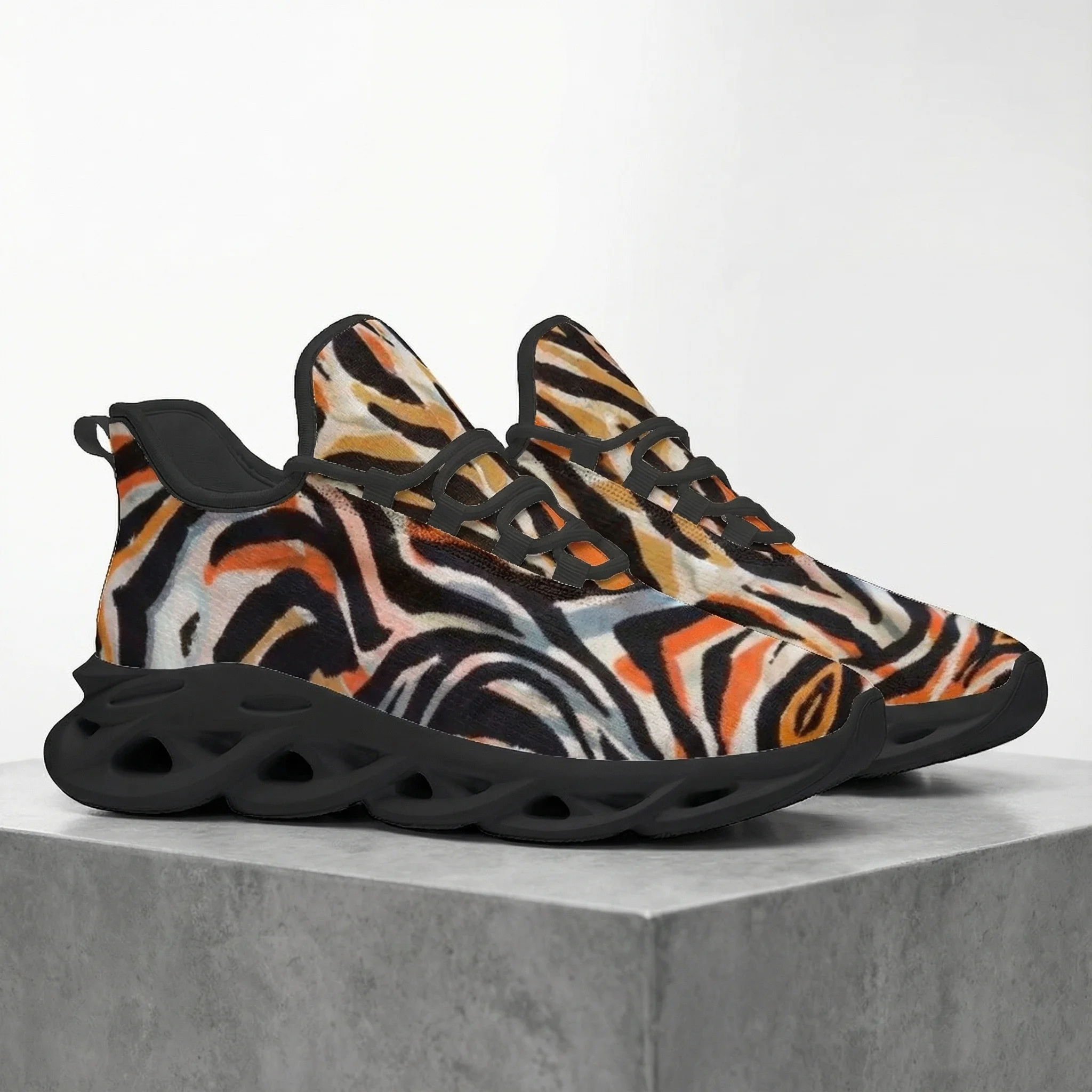 

Man and woman casual athletic shoes, featuring a black and yellow zebra print, comfortable and breathable running shoes.