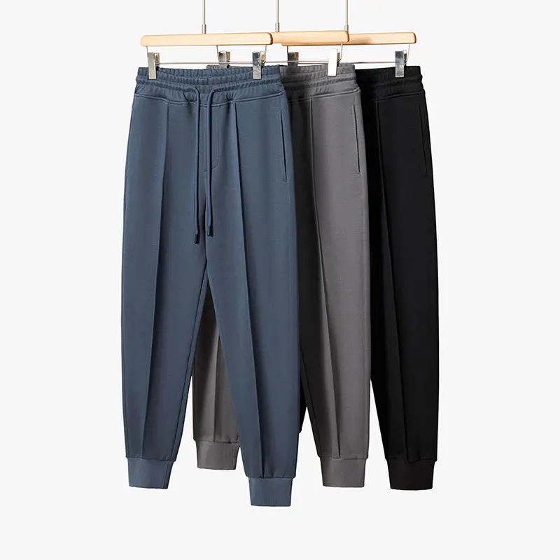

Модные городские мужские повседневные брюки с эластичной талией, свободные спортивные штаны, осенняя новинка, удобные прямые брюки.