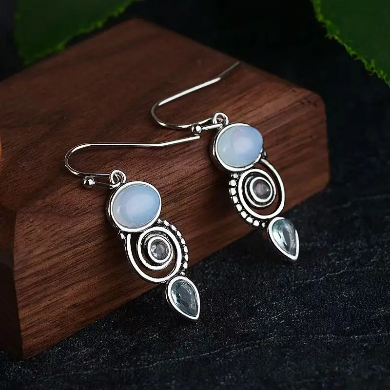 925 sterling silver creative rotating water drop earrings inlaid sea blue pear pendant
