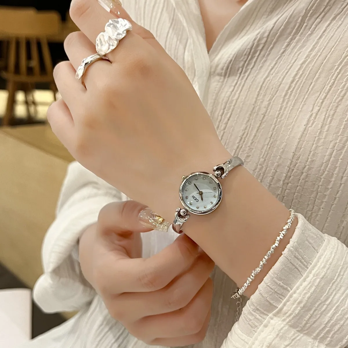 قمة الموضة العلامة التجارية السيدات ساعة اليد كامل الصلب مقاوم للماء الطلب الصغير الكوارتز الفضة المرأة فستان ساعة Reloj Mujer Montre فام