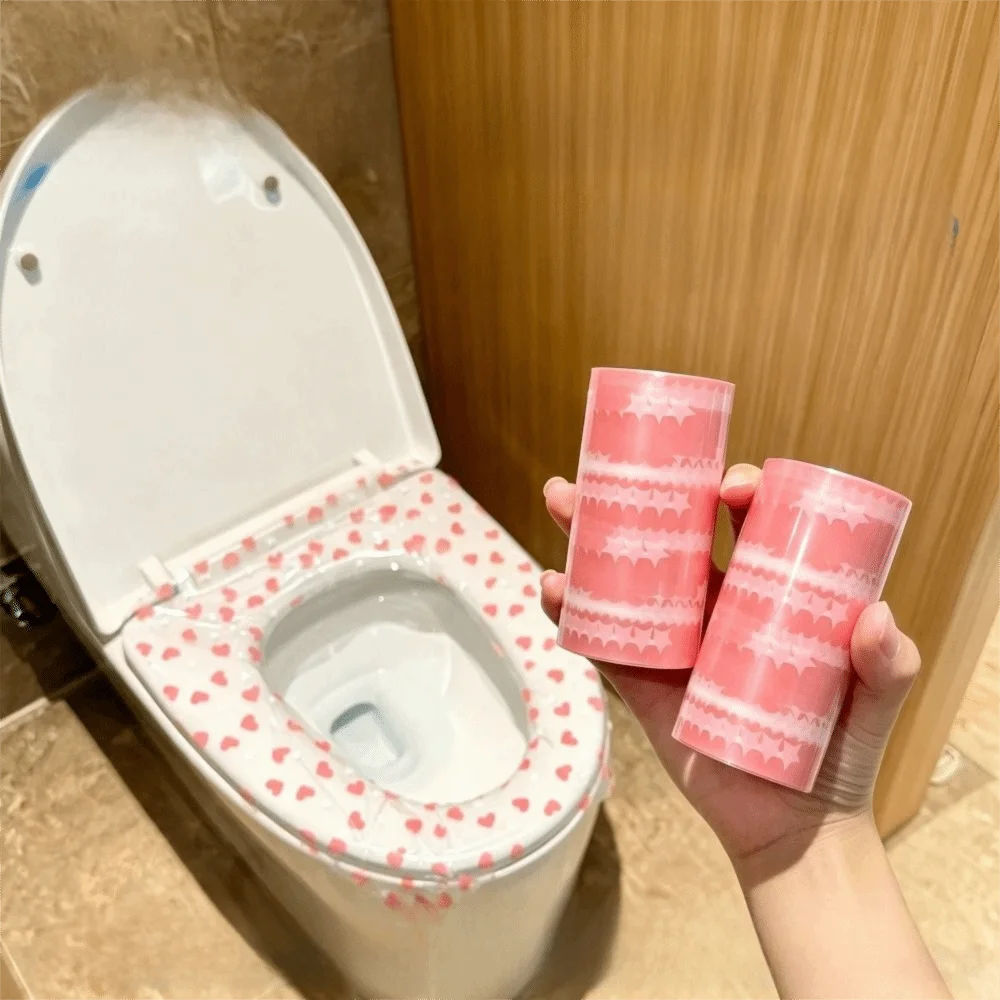 Heart Print Disposable Toilet Seat Covers Waterproof Film Material Adhesive Strips Hygienic Toilet Seat Covers Single-Use Design