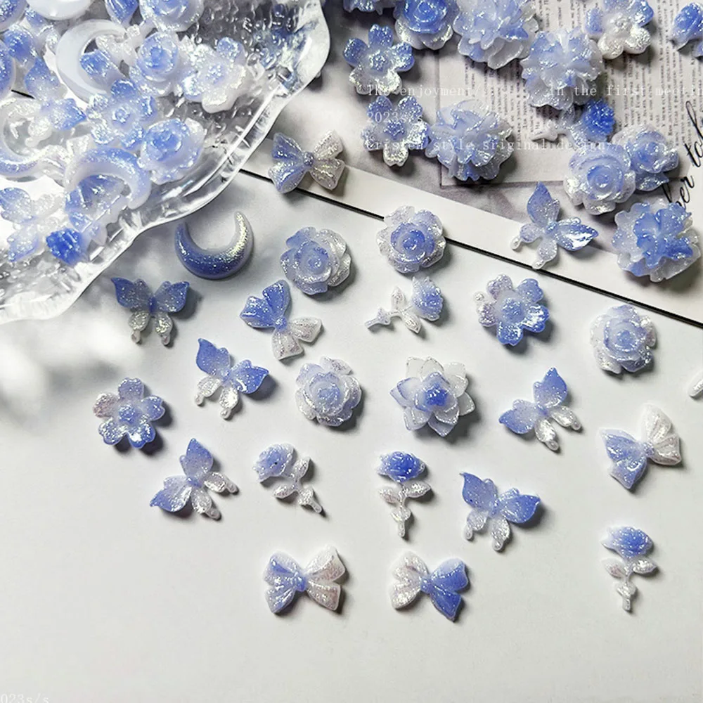 50 قطعة مضيئة التدرج مسمار السحر الأزرق اللون زهرة الورد فراشة مسمار الزينة DIY بها بنفسك الاكريليك الراين ثلاثية الأبعاد مانيكير أجزاء