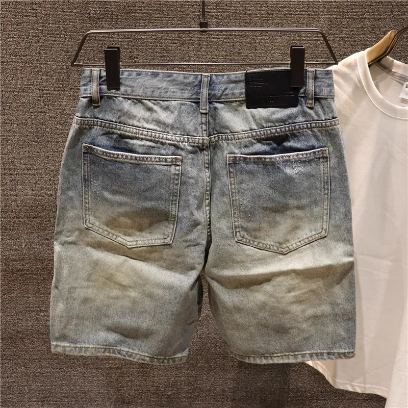 

Джинсовые брюки в стиле ретро с дырками, мужские летние трендовые прямые брюки без эластичных пяти четвертей, повседневные свободные брюки на молнии средней длины с застежкой-молнией...