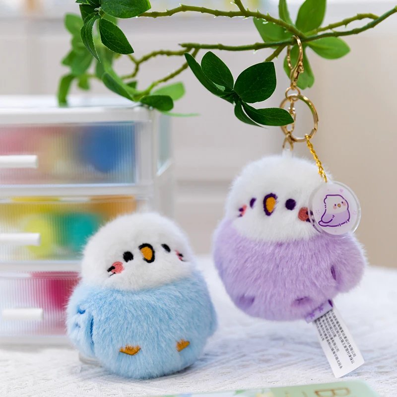 

Cute sound-making bird pendant, bag charm, chirping plush toy, keychain, cartoon doll, and figurine ornament.