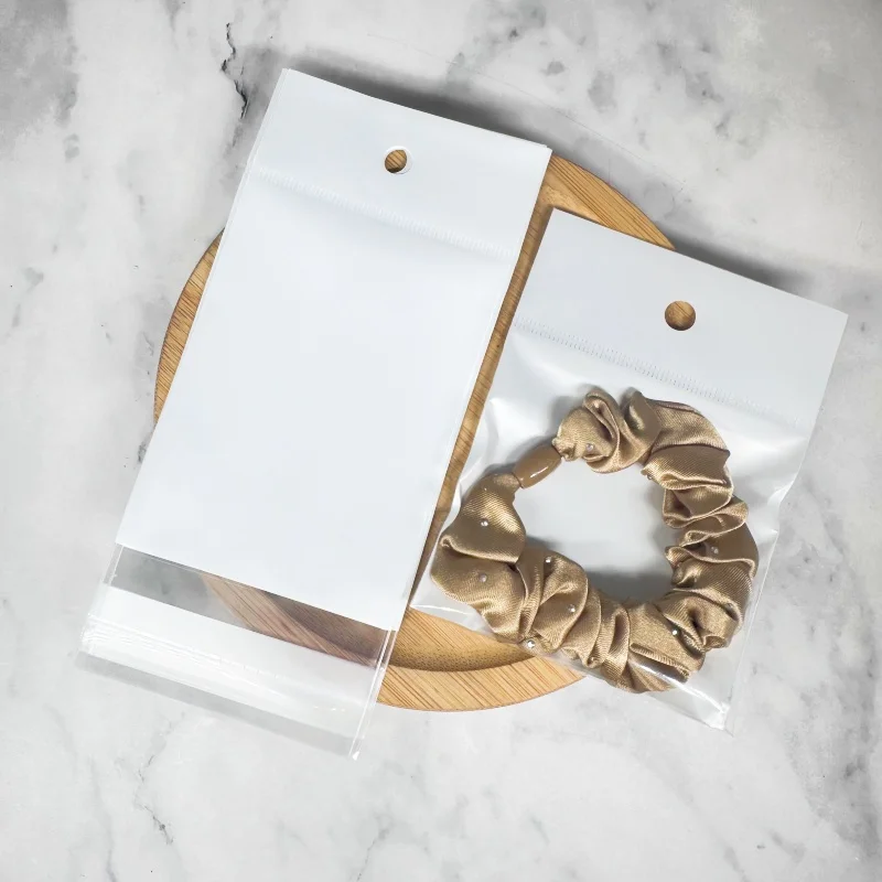 50 White Bottom Transparent Pouch OPP Bag Self Sealing Adhesive Storage Bags with Hang Hole for Jewelry Retail Display Package