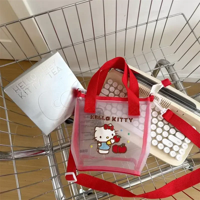 Sanrio Hello Kitty-Bolso de hombro de malla Kawaii, bolso Bento de mano con estampado bonito, bolso ligero transparente, regalo para niña